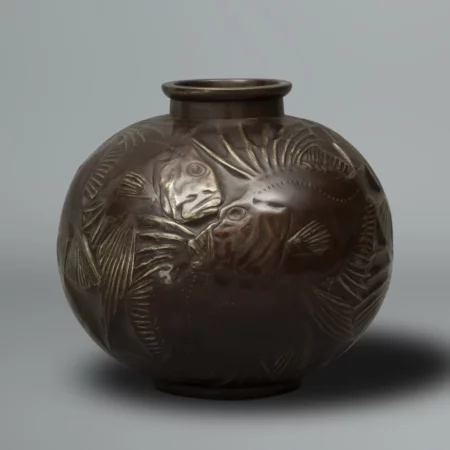 Rare cast bronze vase depicting fish. The design of this vase originally created by René Lalique in 1921 (Vase Poissons) by the Shobido Company