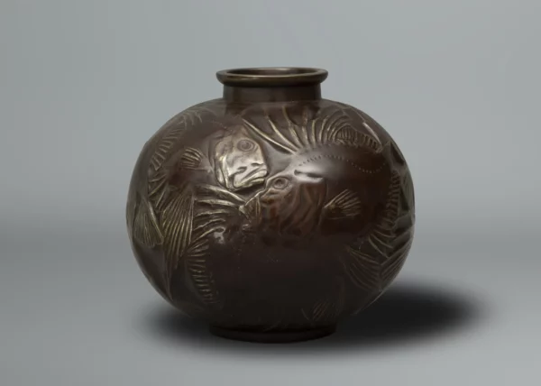 Rare cast bronze vase depicting fish. The design of this vase originally created by René Lalique in 1921 (Vase Poissons) by the Shobido Company