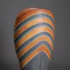 Ichino Masahiko A tall and sculptural ceramic vase, the upper section with stripes in blue, dark orange, and black enamel,
