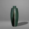 Green and golden-black patinated copper vase, inlaid in silver.