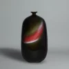Sadamatsu Zenji, tall ceramic vase in black and red cinnabar enamel
